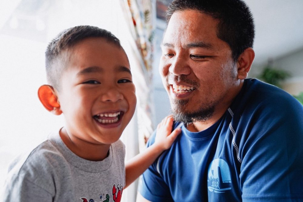 Dad and son at home