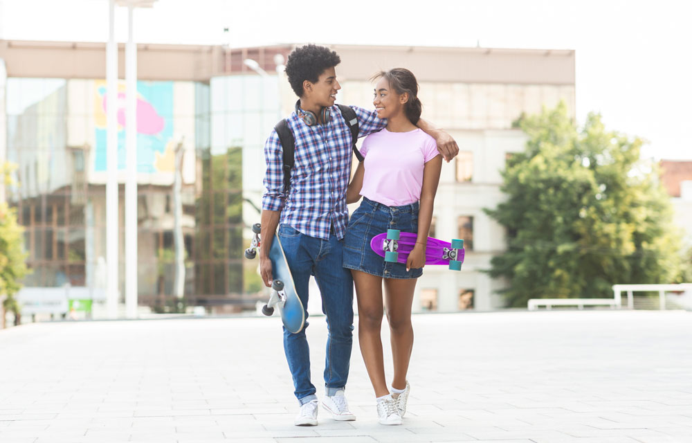 Dating teens walking together
